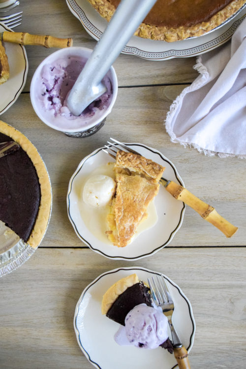 Pie and Ice Cream on a light colored wood table